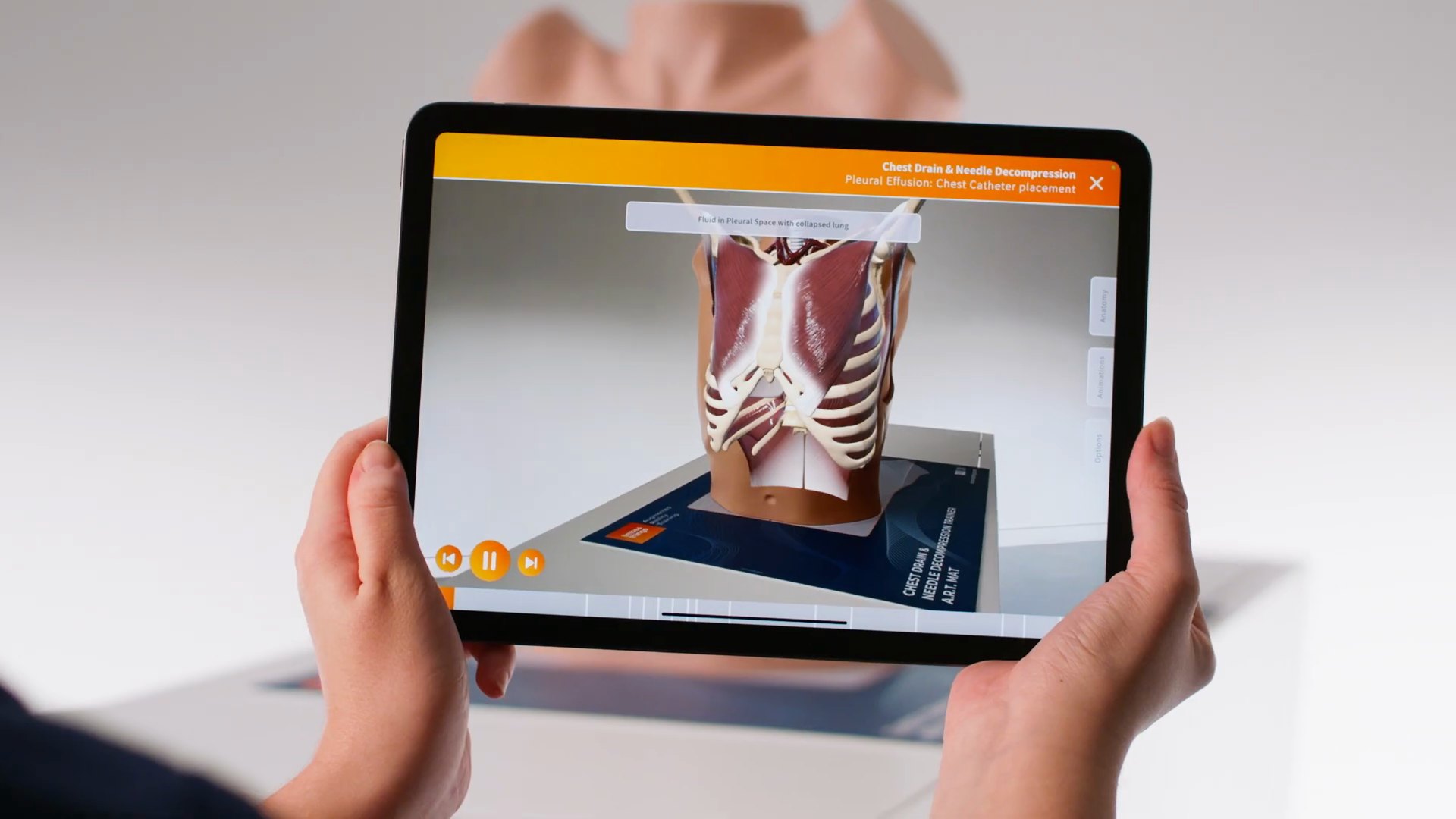 The Chest Drain & Needle Decompression Trainer with its anatomy overlaid in AR