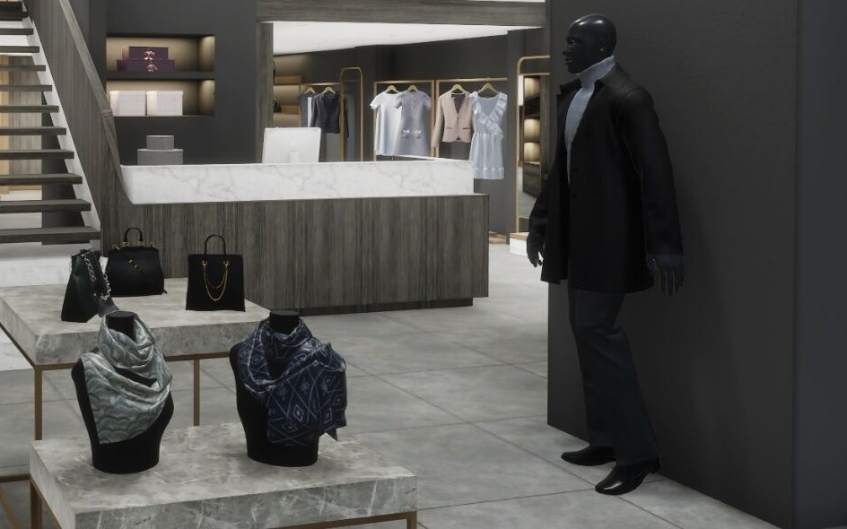 Scarves and leather bags on marble tables beside the counter