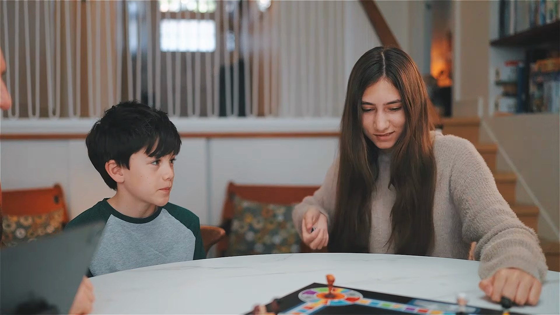 Kids against teens: playing in teams around the board